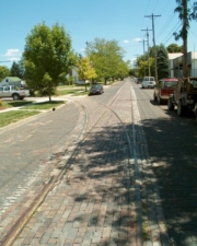 An old depot station once sat where the track curved to the left.