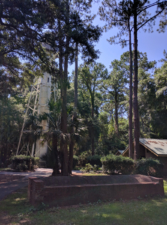 This photo shows both the oil house and lighthouse.