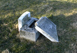 One of the broken stones that were on the ground.