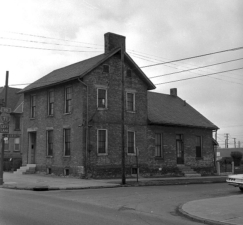 Another old photo of the house. The quality on this one is better and you can see the iron gate and fence behind the house.