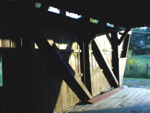 A closer look at the wooden structure and support for Hartman bridge.