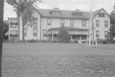 The Hartman family home later served as one of two hotels on the farm, circa 1938.
