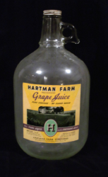 A Hartman Farm grape juice bottle.