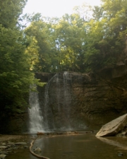 The waster was a good depth at the base of the falls but was very shallow near the large rock.