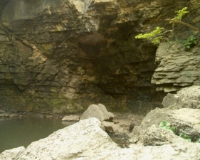 The water had carved this small cave-like area from the rock of a long period of time.
