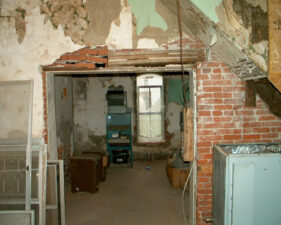 Our first look inside the Haydenville House through a large hole in the side of the building.