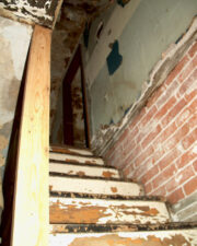 This unsafe stairway led to the upper floor where there was at least two more rooms.