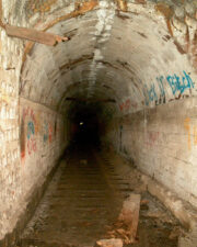 This is where the arched brick roof ended. The spot if light is the end of the tunnel.