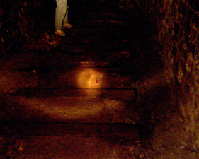 Old wood rail ties were still embedded in the floor of the tunnel.