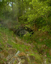 We hiked through the woods in 2005 and discovered the other end of the tunnel. This end is rarely seen.