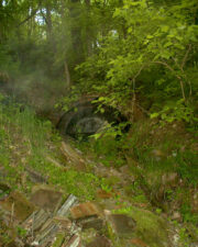 We hiked through the woods in 2005 and discovered the other end of the tunnel. This end is rarely seen.