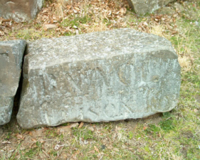 The rock next to it read, "URNACE WILSON."