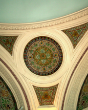 Mosaic tilework in the corners of the main room.