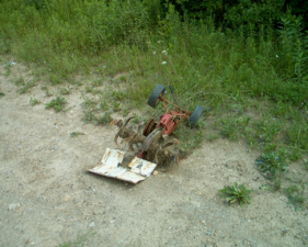 Some type of old machine that was dumped there.