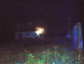 A very low quality night photo of the furnace building.