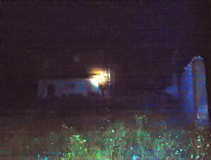 A very low quality night photo of the furnace building.