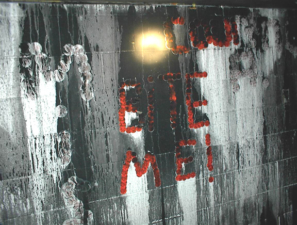 Graffiti made from leftover pizza company stickers.