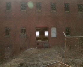 Our entry point into the prison was this old overhead door.