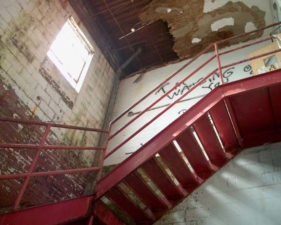 Looking up the red stairwell from the floor where we entered.