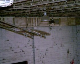 The basketball backboard was missing the hoop.