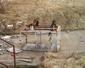 An upside-down cart was just outside of the gym.