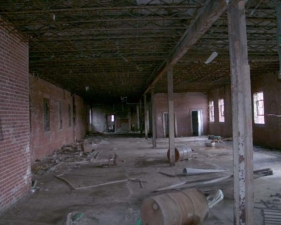 This large room on the ground floor was where prisoner bunks once stood.