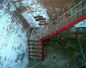 Looking down the center stairwell from the top floor.
