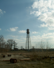 Another angle showing the water tower and the former warden's home.