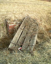 Back outside was a somewhat collapsed footbridge that crossed over a ditch.