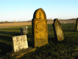 Most of the stones were weather worn and some were broken. The one in the middle belonged to Mary Magdaline Plum, wife of Jacob Plum. Born in 1788, Mary died on March 24, 1839.