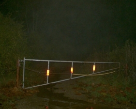 Another gate blocked a small path at the end of the road.