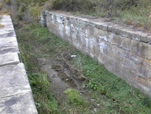 A small puddle at the bottom of Lock 27.