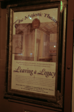 A poster about the Majestic's legacy in front of the theatre.