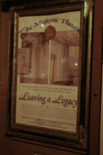 A poster about the Majestic's legacy in front of the theatre.