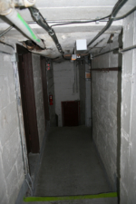 The basement hallway near the star dressing room.