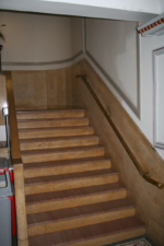 The main stairway in the foyer area.