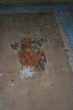 A shield painted on the wall.