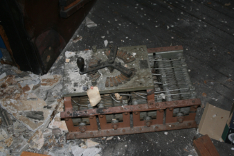 Some type of old equipment was on the ballroom floor.