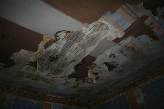Some of the ceiling had fallen in this room and needed repaired.