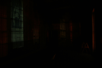 Light from downtown Chillicothe cast perfectly onto the Templar paintings.