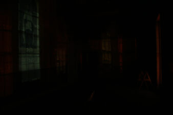 Light from downtown Chillicothe cast perfectly onto the Templar paintings.