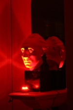 The bust in the entertainment room lit with a red LED.