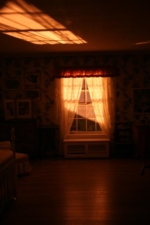 The outside light shined through Bogart's window.