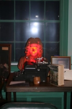 The face even glowed red with the camera flash.