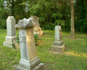 The tombstone for John Klinger, who died in 1887, is in the foreground.