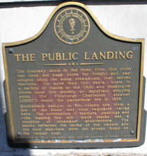 Just beyond this sign was a public landing where the roadway extended down to the Ohio River. For more than 100 years, this was the place where goods were exchanged.