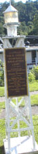 The Captain Tom R. Greene Memorial navigation light. Tom Greene was president of Greene Line Steamers, now the Delta Queen Steamboat Company. He purchased the Delta Queen steamboat that ran on the Mississippi and Ohio Rivers.