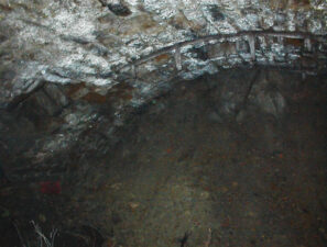 The remains of a gated archway in the winery tunnel.