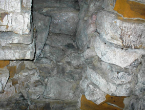 Stacks of brick and stone that formed the wall of the tunnel.