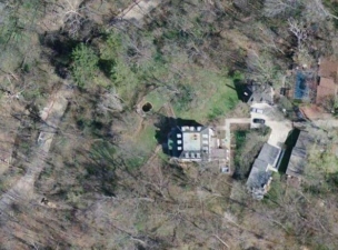 A satellite view of the mansion with Walhalla Road running to the left.